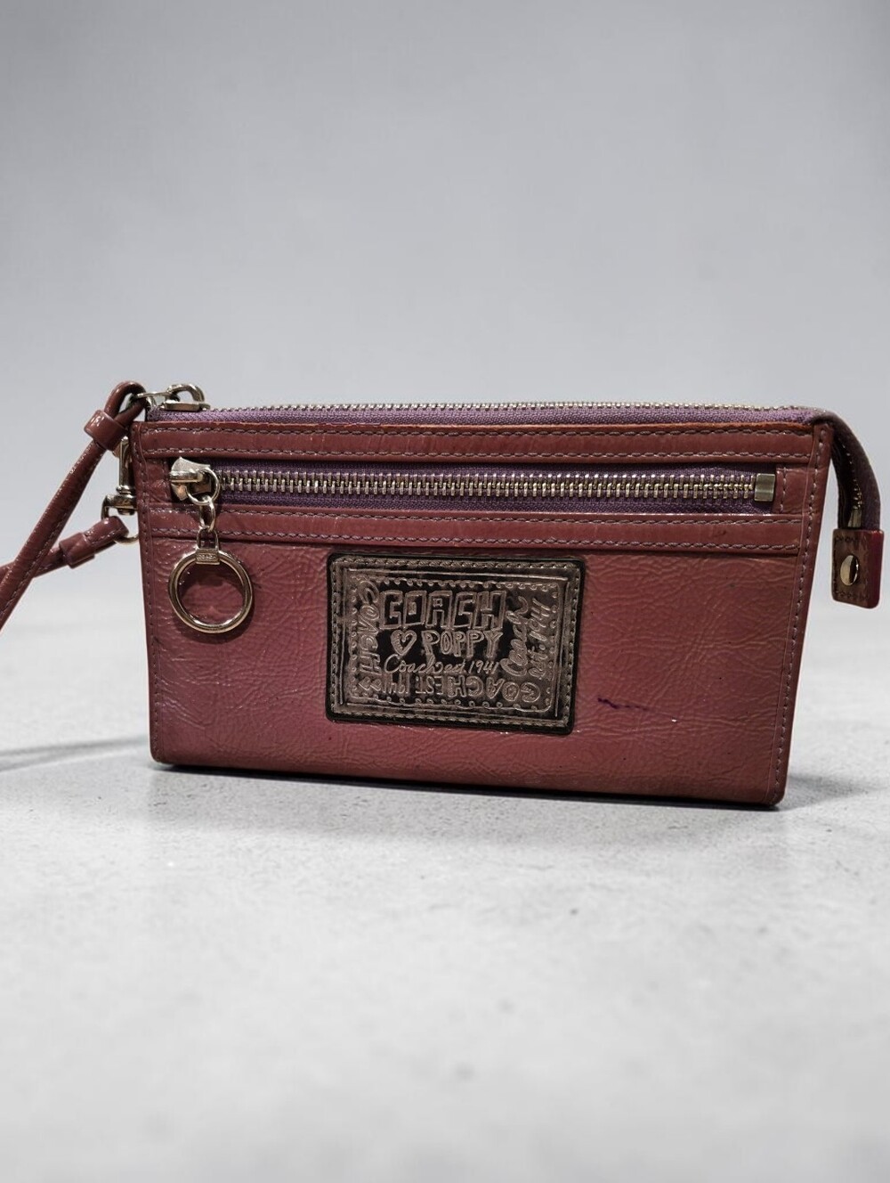 Coach Poppy Leather Zippy Wristlet Wallet In Berry-Purple